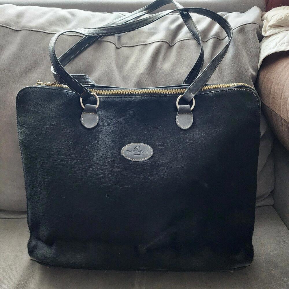 EUC Tangaroa Briefcase by venezia black leather on back side calf hair on front